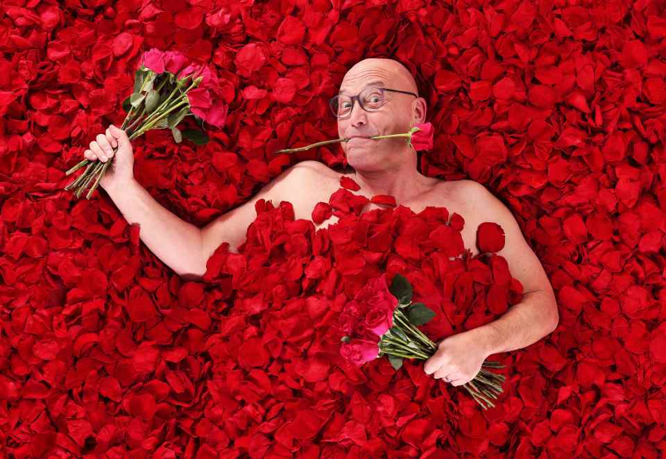 MasterChef star Greg Wallace stripped off in a bed of roses