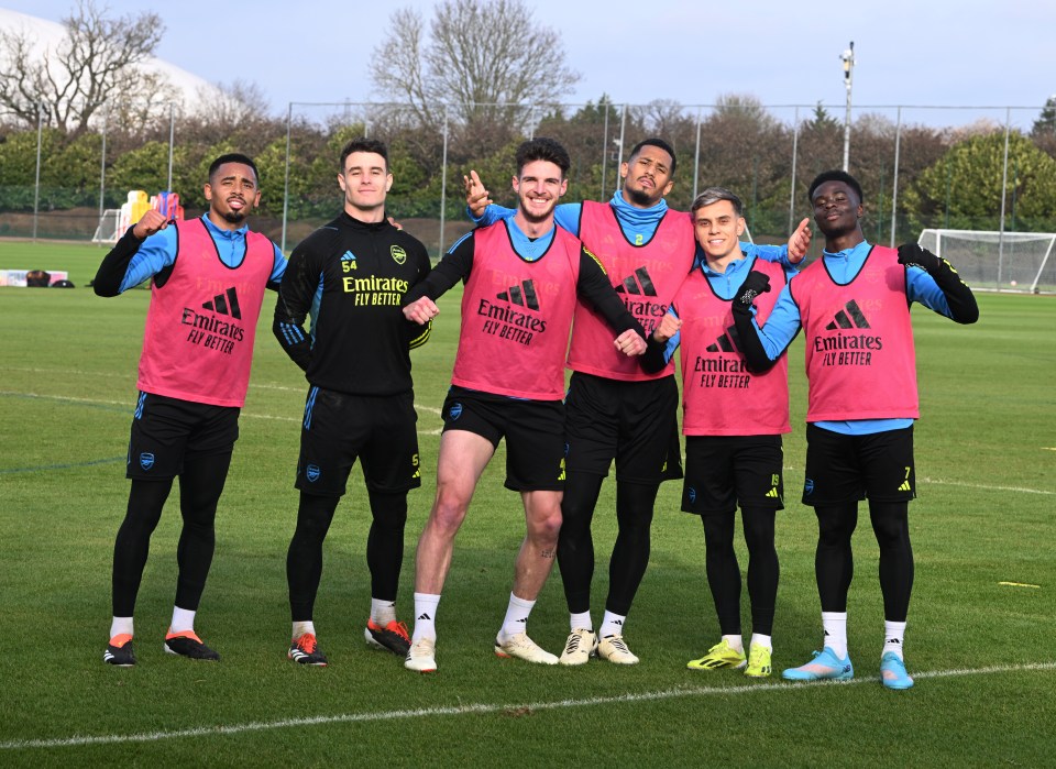 Arsenal's players pose for a snap at their renamed training HQ