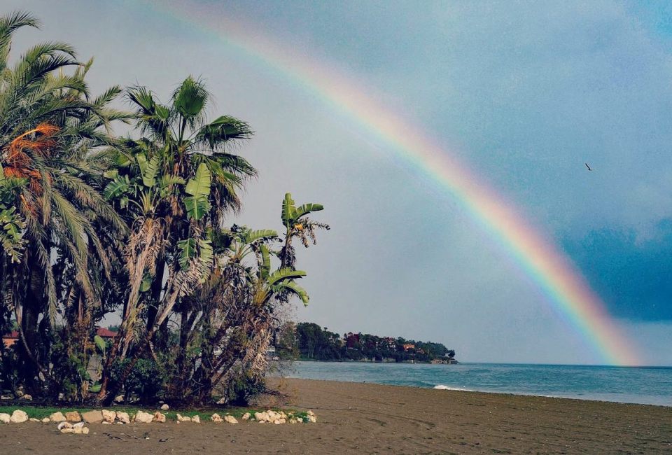 She shared a photo of a rainbow over the beach