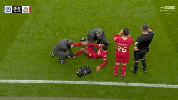 The Liverpool midfielder went down holding his ankle