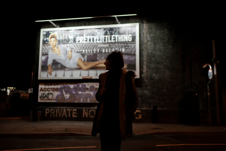 A sex worker waits for a customer on the streets of Holbeck in 2018