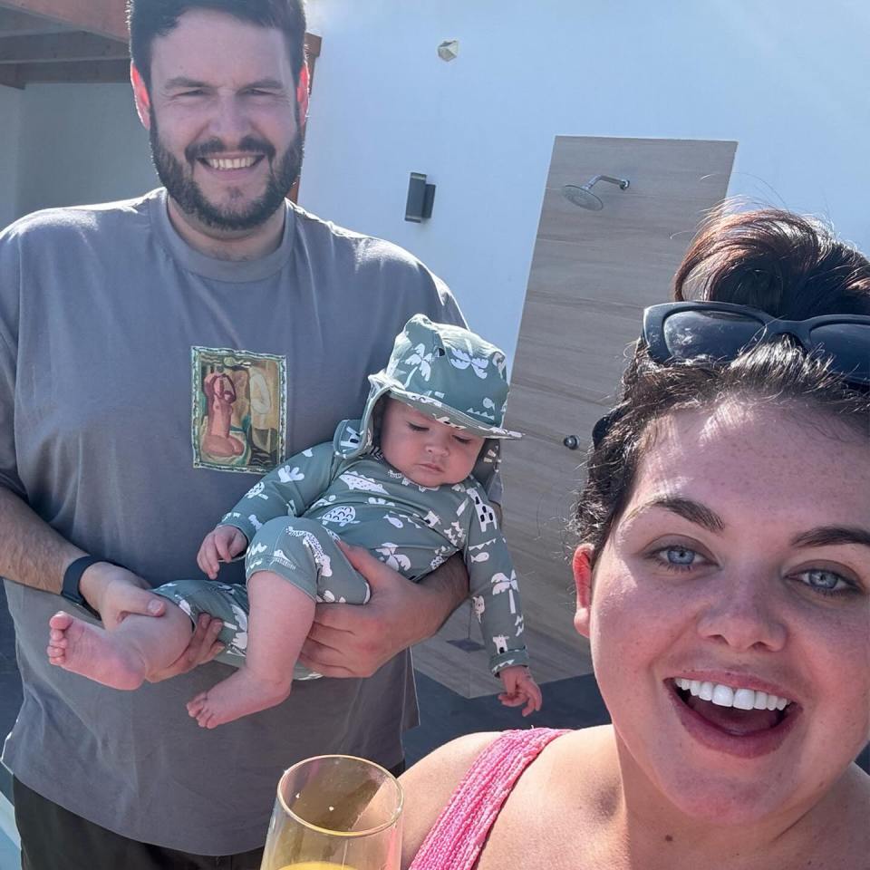 Scarlett pictured with her fiance Scott and their son Jude