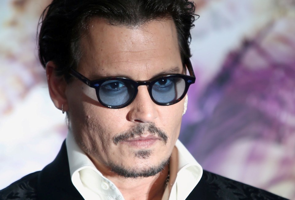 Johnny Depp attended the European film premiere of Alice Through The Looking Glass in these black frame glasses