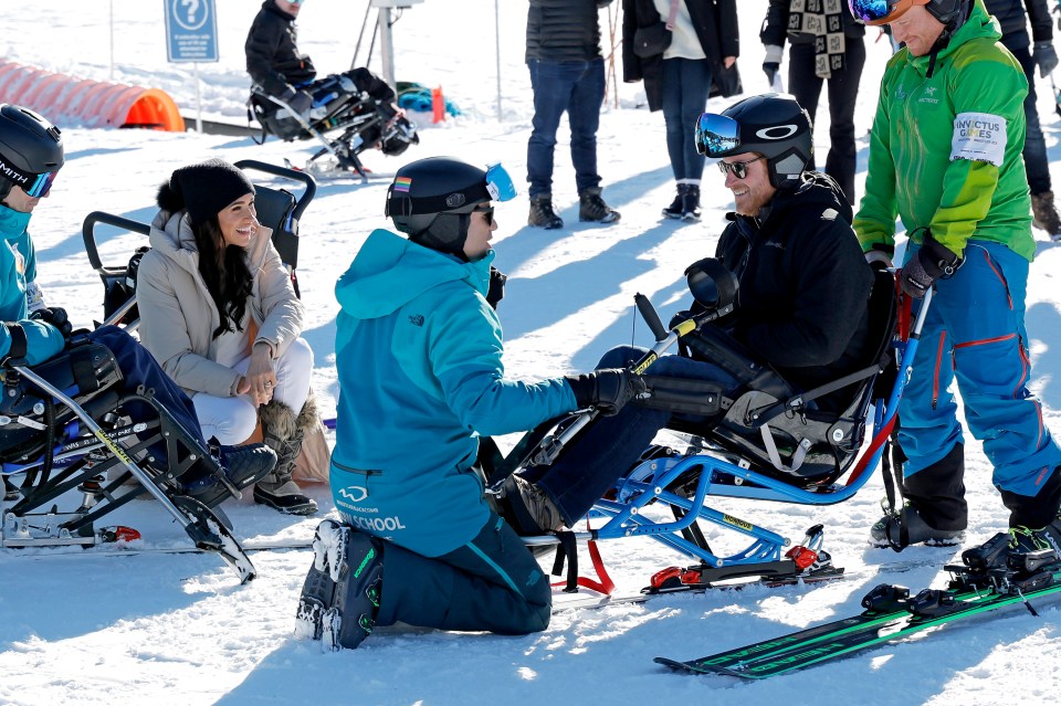 Harry jumped into one of the sit-skiis