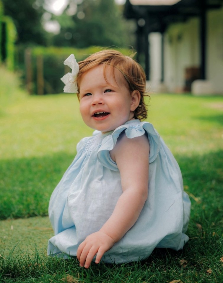 Adorable Princess Lilibet enjoying playing outside