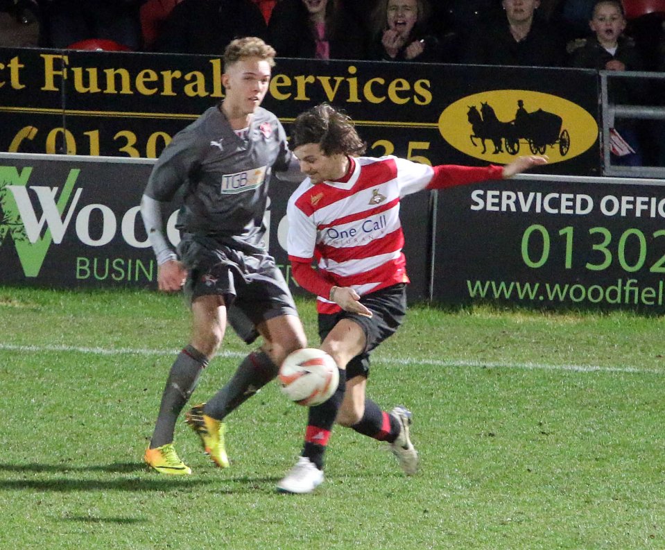 Boyband singer Tomlinson in action for his beloved Doncaster Rovers