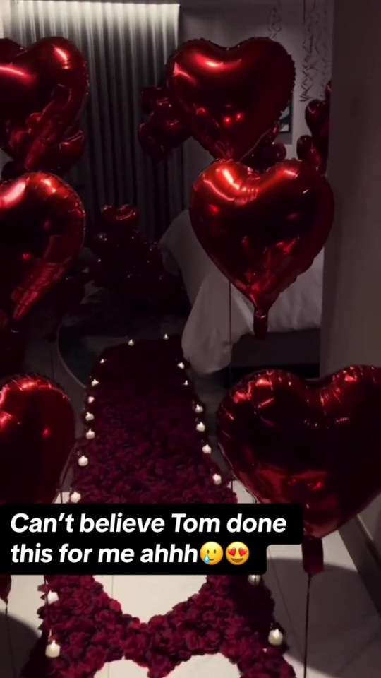 He used rose petals, balloons and candles to make the moment as romantic as possible