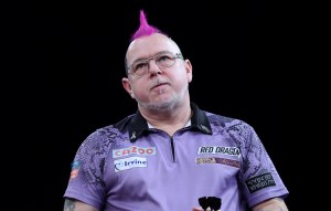  Peter Wright had a purple mohawk during week one of the Premier League Darts