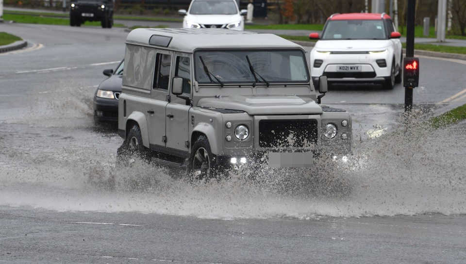 A driver causes a splash at Manchester Airport