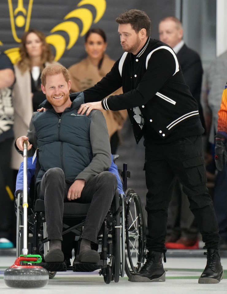 Prince Harry and Micael Buble joined a training session for curling competitors at the Invictus Games launch today