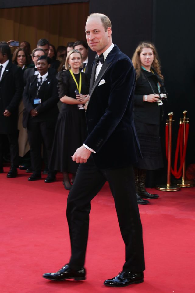 Prince William grinned as he arrived at the Baftas in London this evening