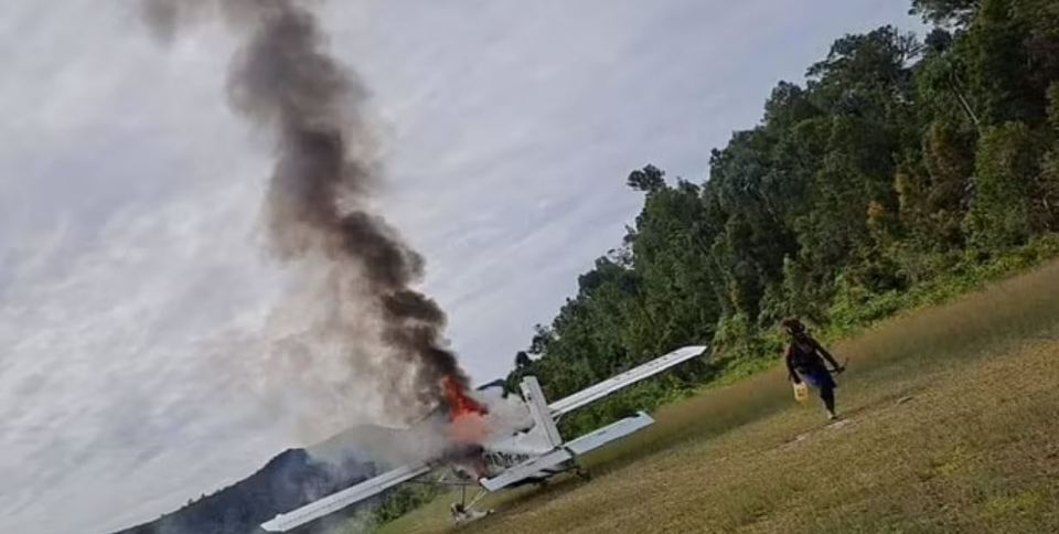 Mehrten's plane is seen up in flames following his capture