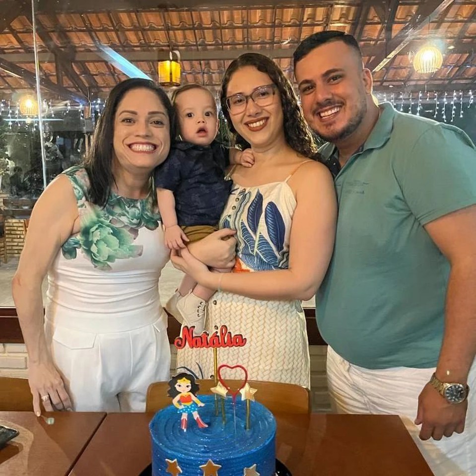 Mums Natalia Nogueira (centre) and Jamille Ferreira (left) with dad Ruan Vieira (right) and baby Bernardo