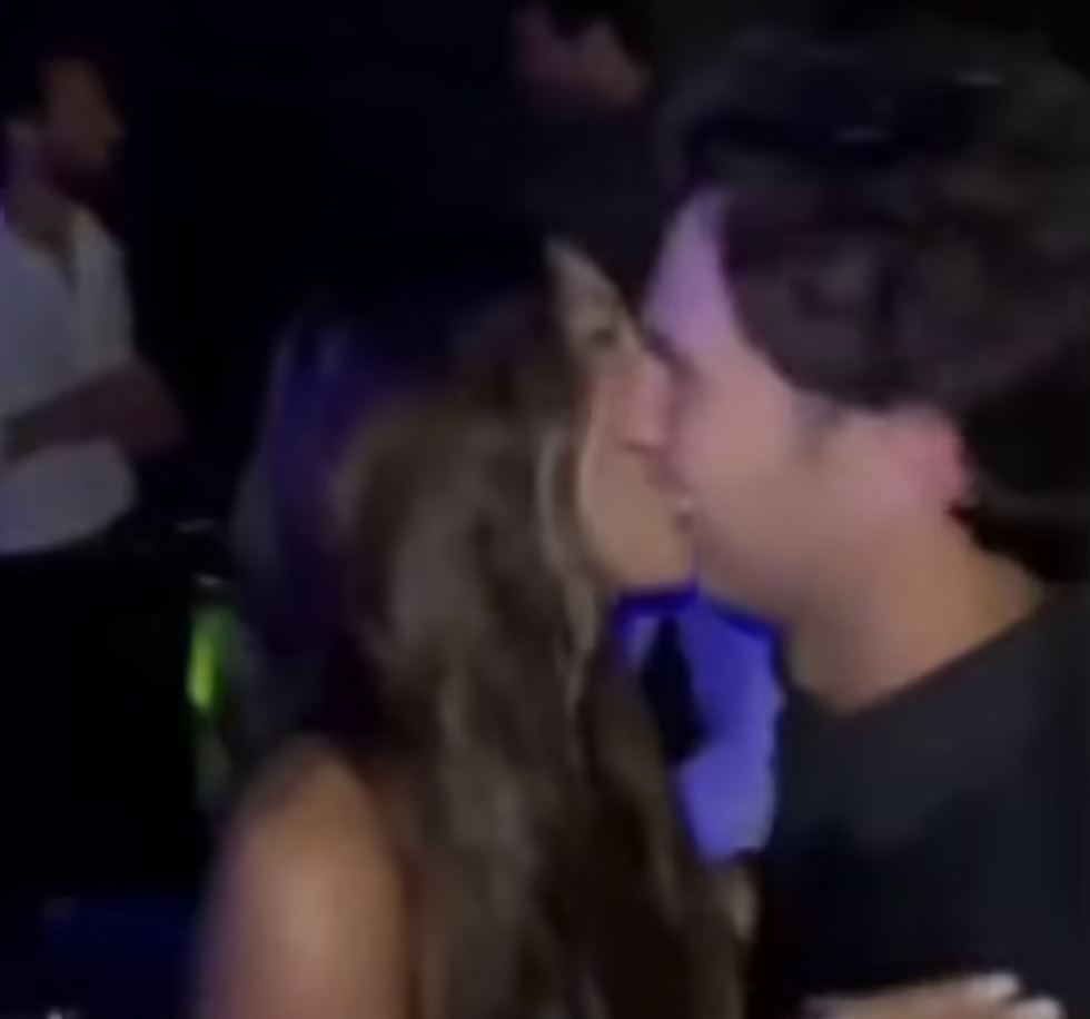 Perez was seen embracing a brunette during the yacht party