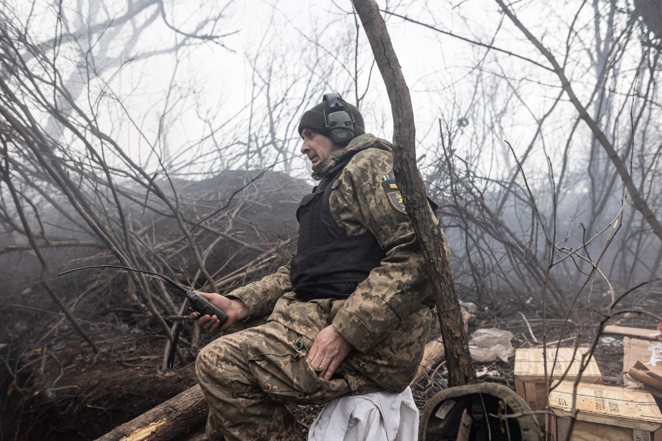 A Ukrainian soldier awaits orders as his country’s battle against the invading troops of Vladimir Putin continues