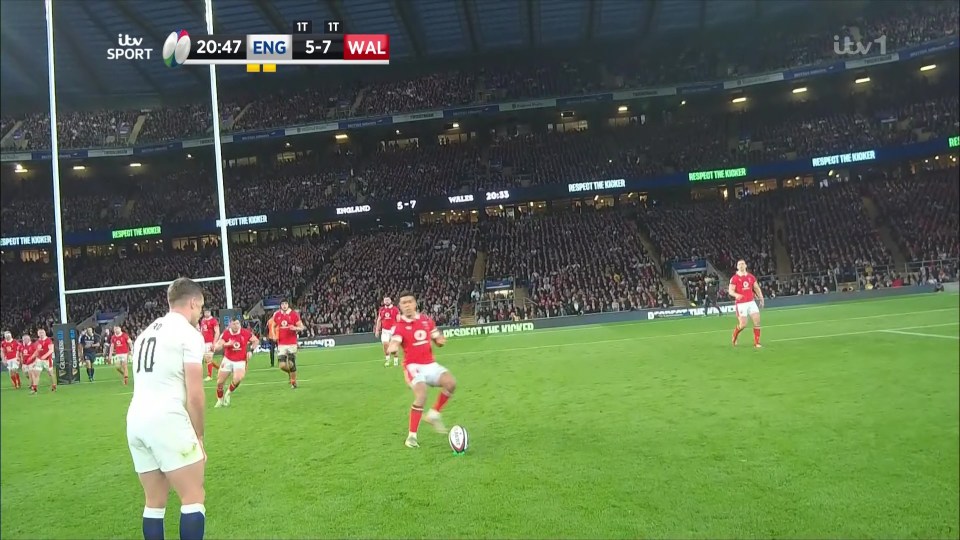 George Ford started his run-up before stopping so Wales charged down the ball