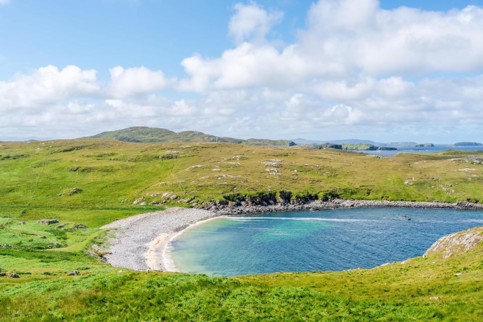 The small village overlooks a secluded bay in the Outer Hebrides