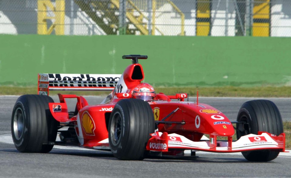 World Formula One champion Michael Schumacher of Germany tries out the brand-new Ferrari F2003-GA model