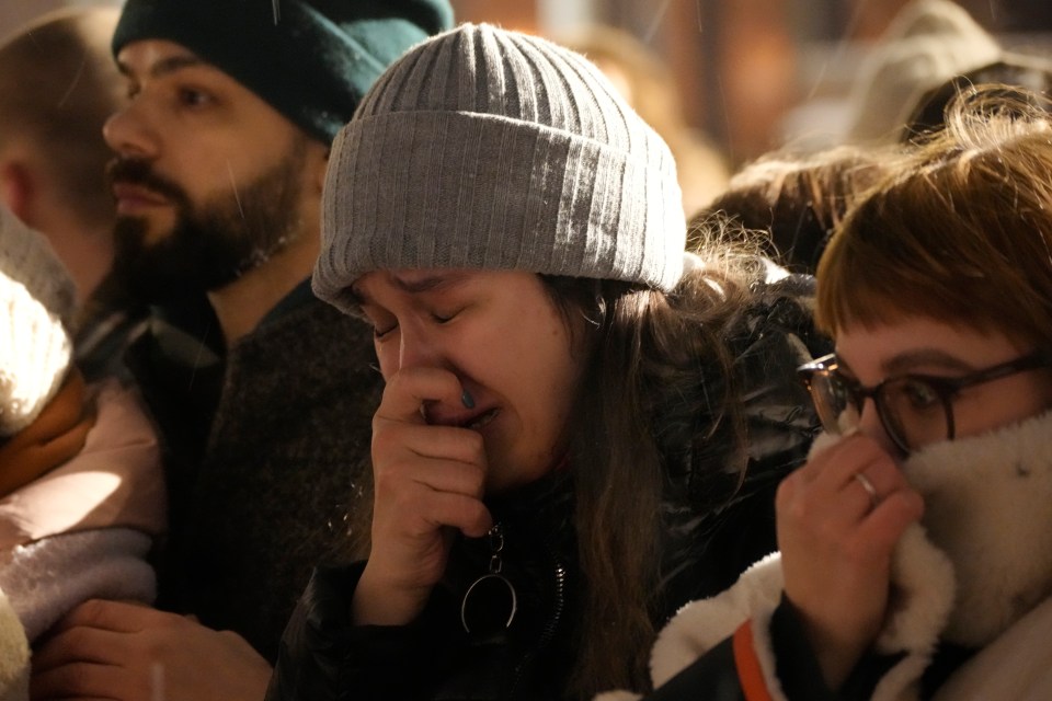 People pay respect to late Navalny at the Memorial to Victims of Political Repression in St Petersburg