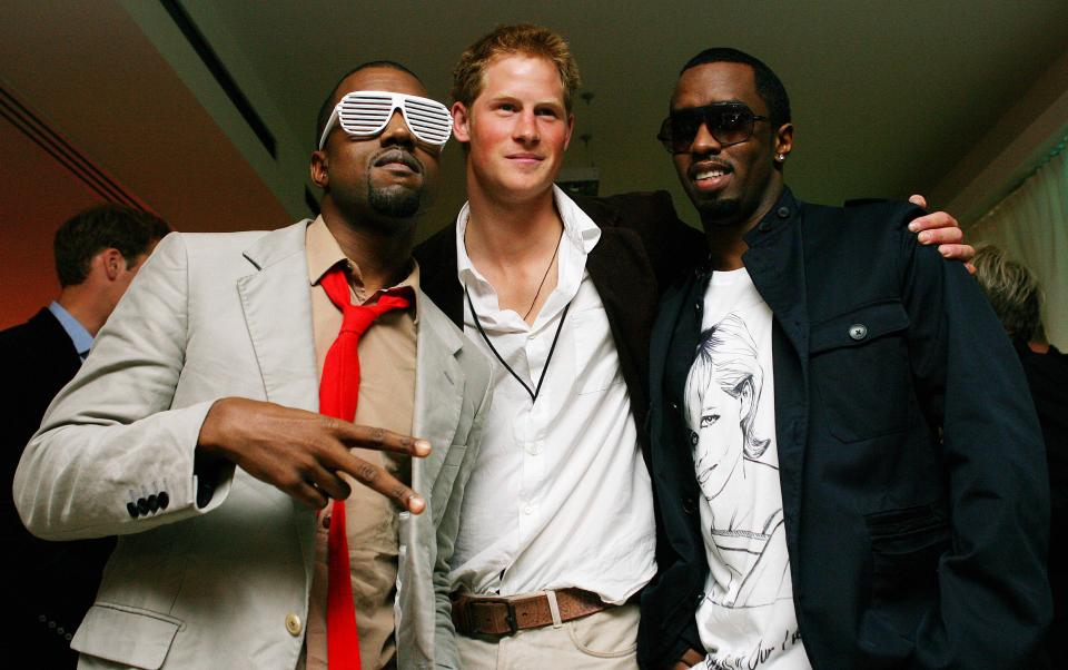 Prince Harry, pictured with Kanye West, left, and Sean 'Diddy' Combs, right, after Concert for Diana at Wembley in 2007