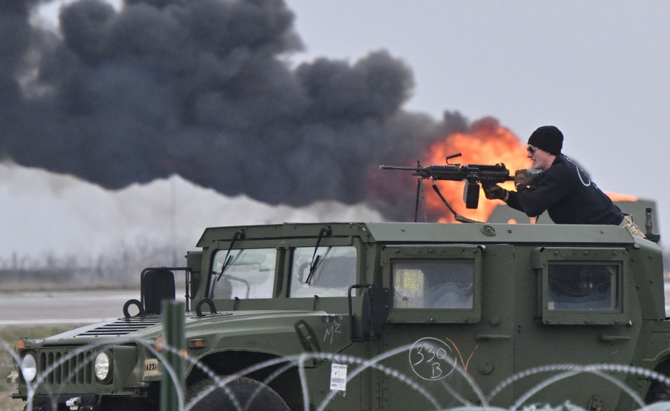 A soldier takes part in a demonstration of the US Army 101 Airborne division during the brigade rotation at Mihail Kogalniceanu Air Base