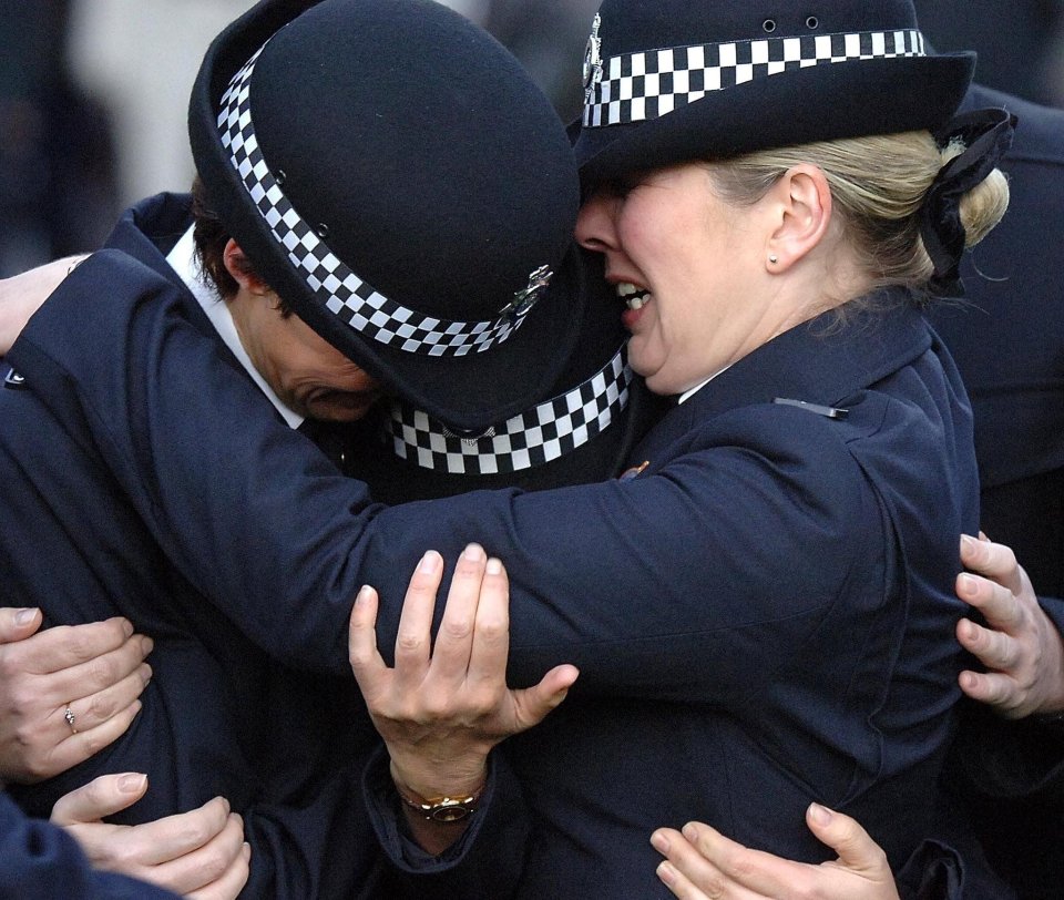 She is supported by colleagues at PC Beshenivsky's funeral