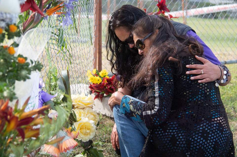 Flowers were laid on the waterfront near White Island Tours offices, in Whakatane, to remember the dead