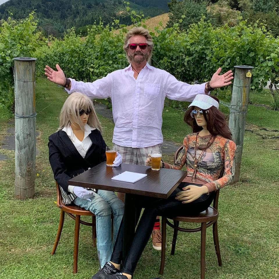 The former TV star, posing with two dummies, moved to New Zealand with wife Liz in 2019