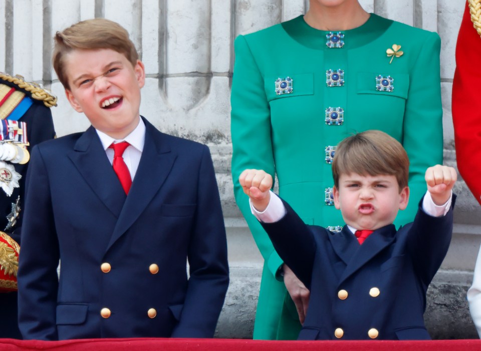 Prince George of Wales and Prince Louis of Wales watch an RAF flypast from the balcony of Buckingham Palace during Trooping the Colour on June 17, 2023 in London