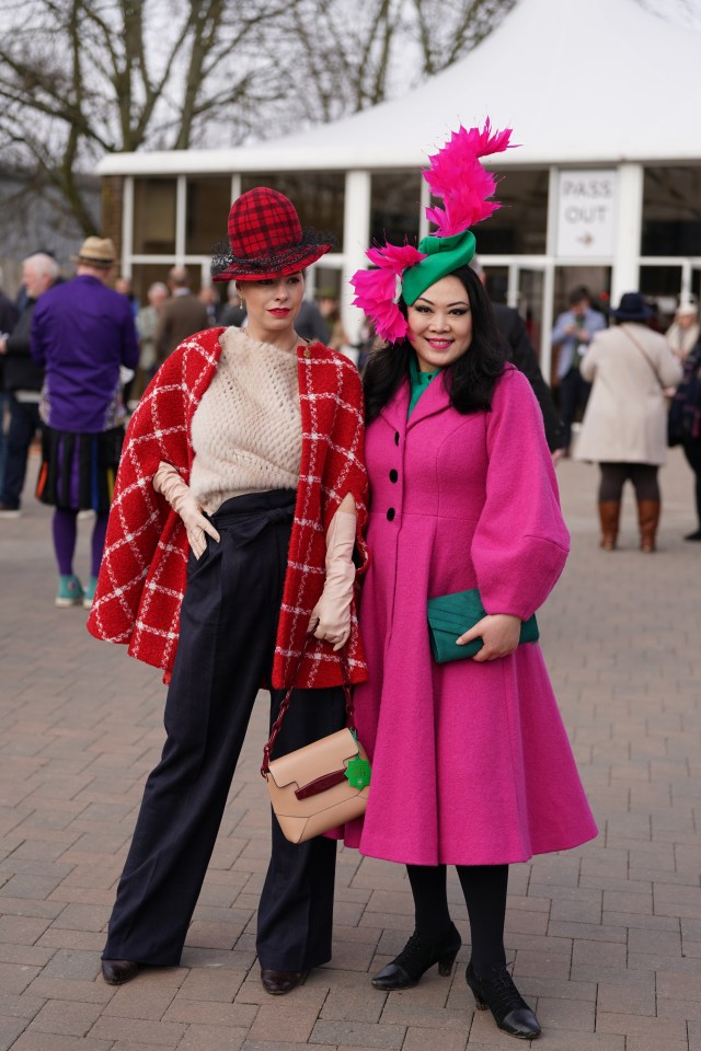 Two pals went bold for their Cheltenham looks, with statement coats and matching hats