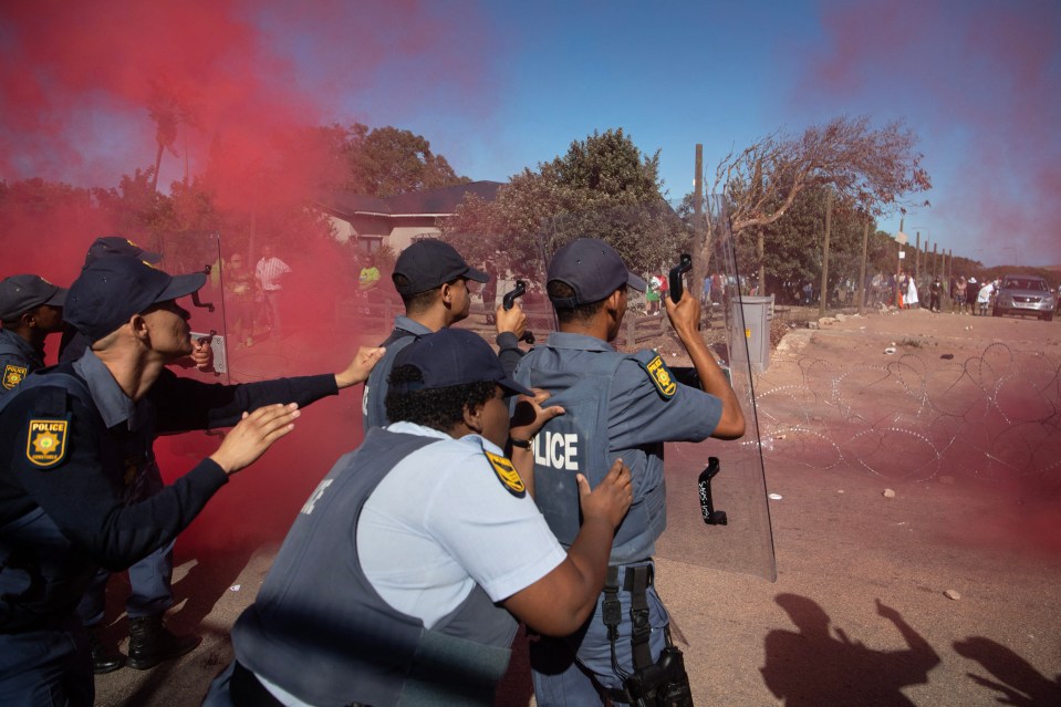 South African Police Services (SAPS) officers have been clashing with protesters in South Africa