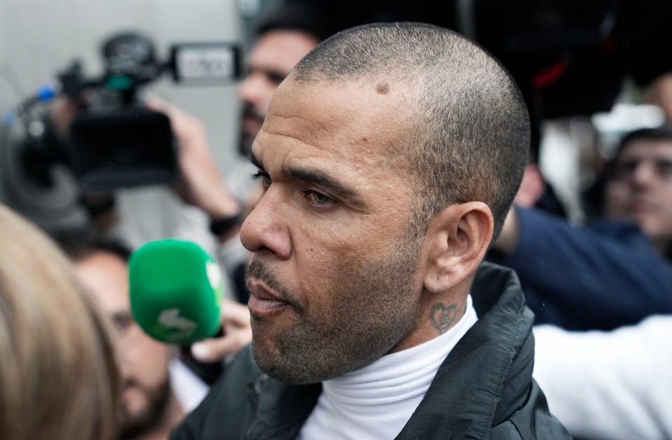 Alves did not speak as he walked out of his jail