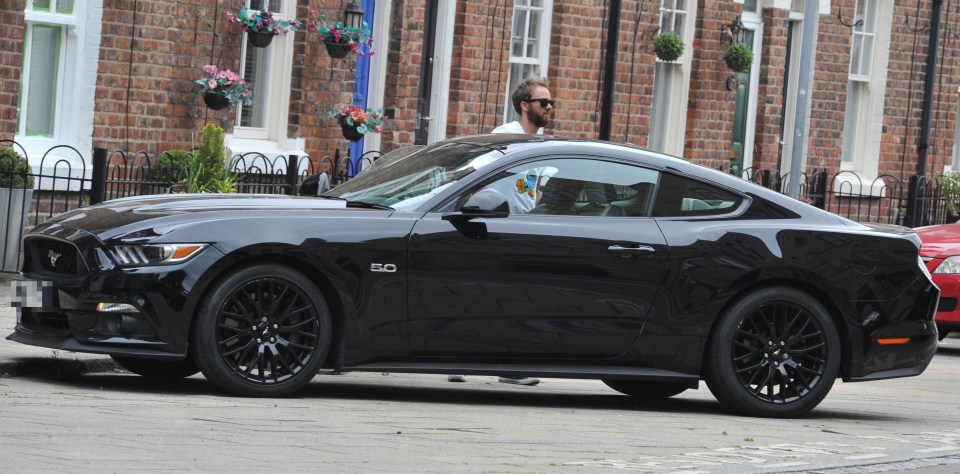 Jack's car of choice appears to be a flashy Ford Mustang