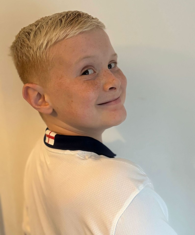 Bobby wearing his England shirt with pride after his gran went to work