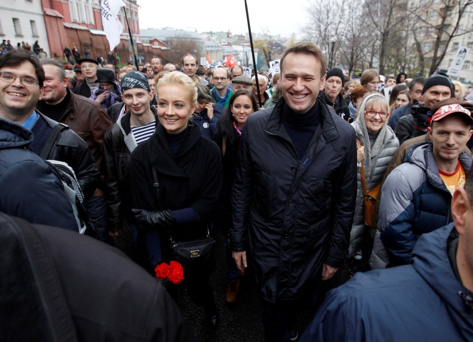 Navalny and his wife during an opposition rally in Moscow in October 2013