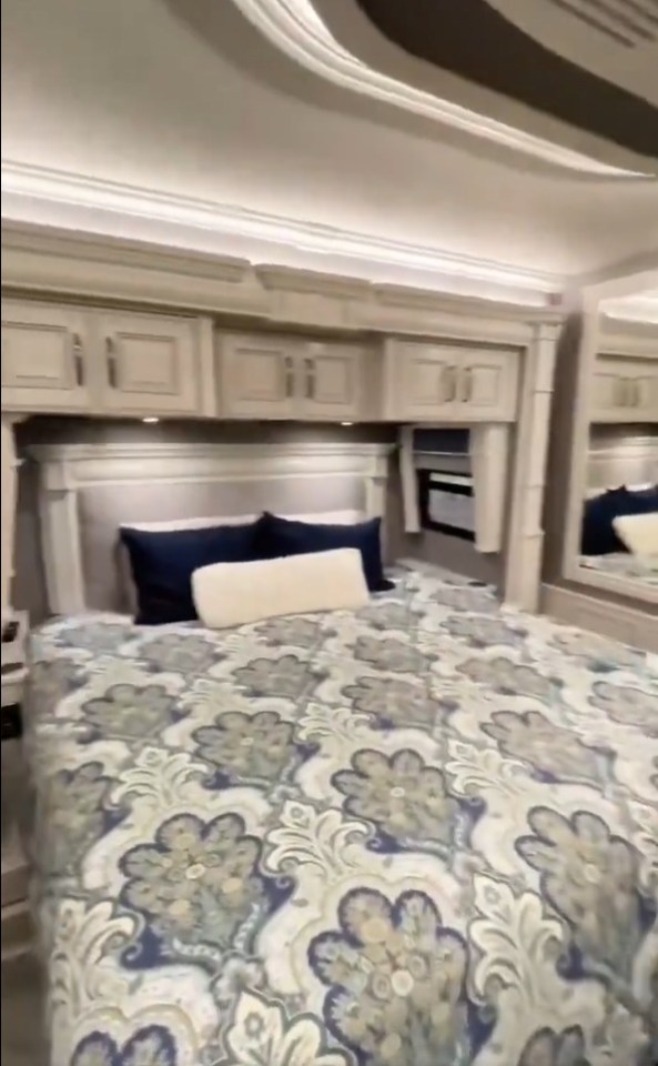 The bedroom holds a king-size bed