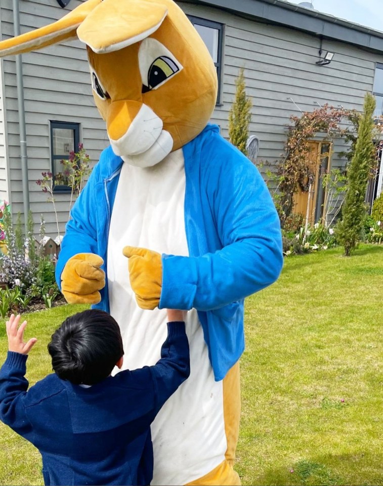 She treated her stepson Tristan to a visit by a giant Easter Bunny