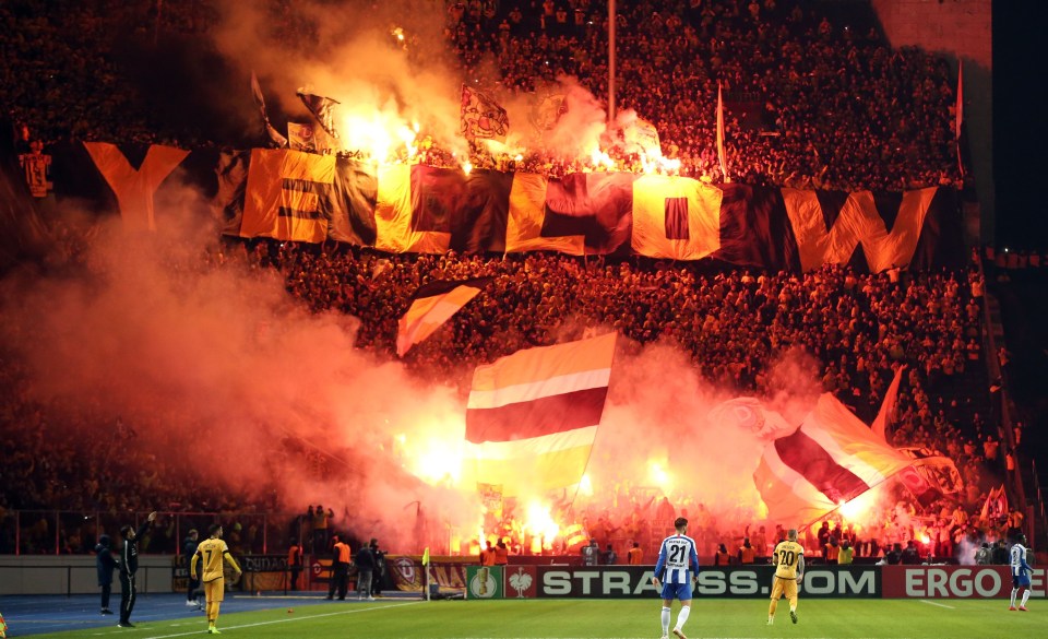 Flares in the crowd during a clash between Hertha BSC Berlin and SG Dynamo Dresden