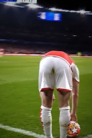 The unfortunate placing of some mud on his backside had footie fans joking that he'd accidentally done a number two