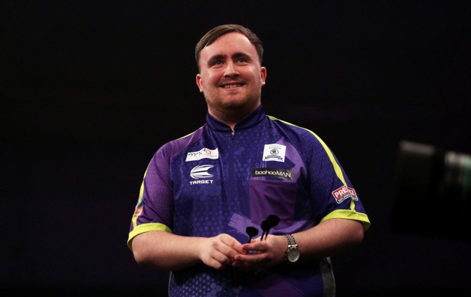 EXETER, ENGLAND - FEBRUARY 29: Luke Littler of England celebrates after throwing against Michael Smith of England (not pictured) during the Quarter-Final at the 2024 BetMGM Premier League Darts at Westpoint on February 29, 2024 in Exeter, England. (Photo by Ryan Hiscott/Getty Images)