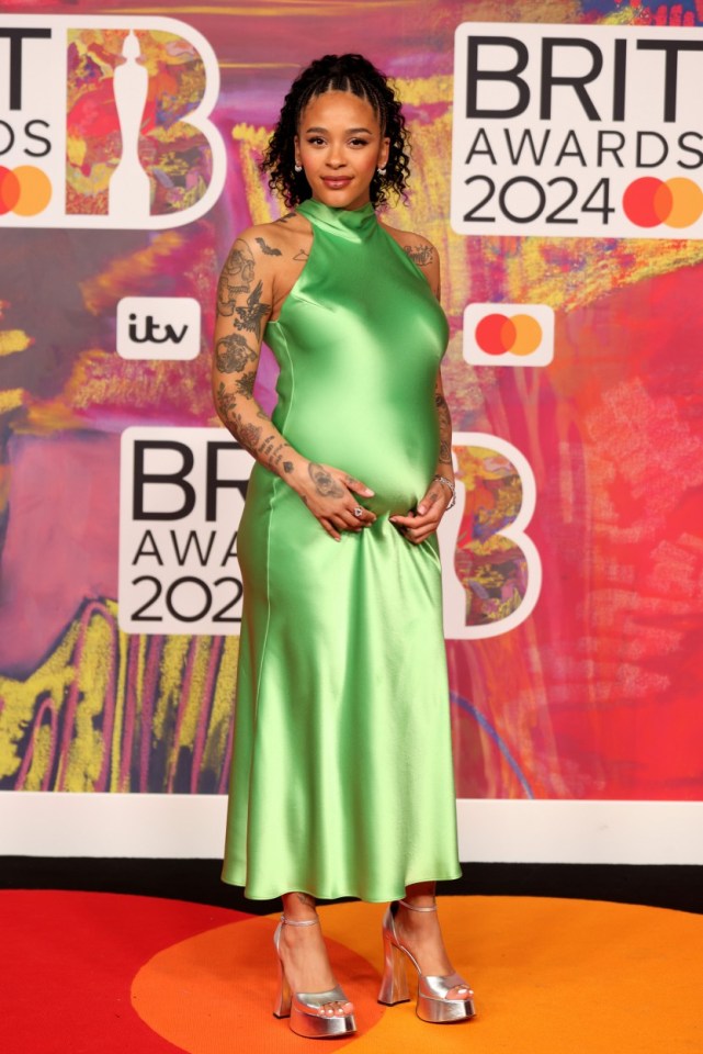 Yinka confirmed her pregnancy on the Brit Awards 2024 red carpet