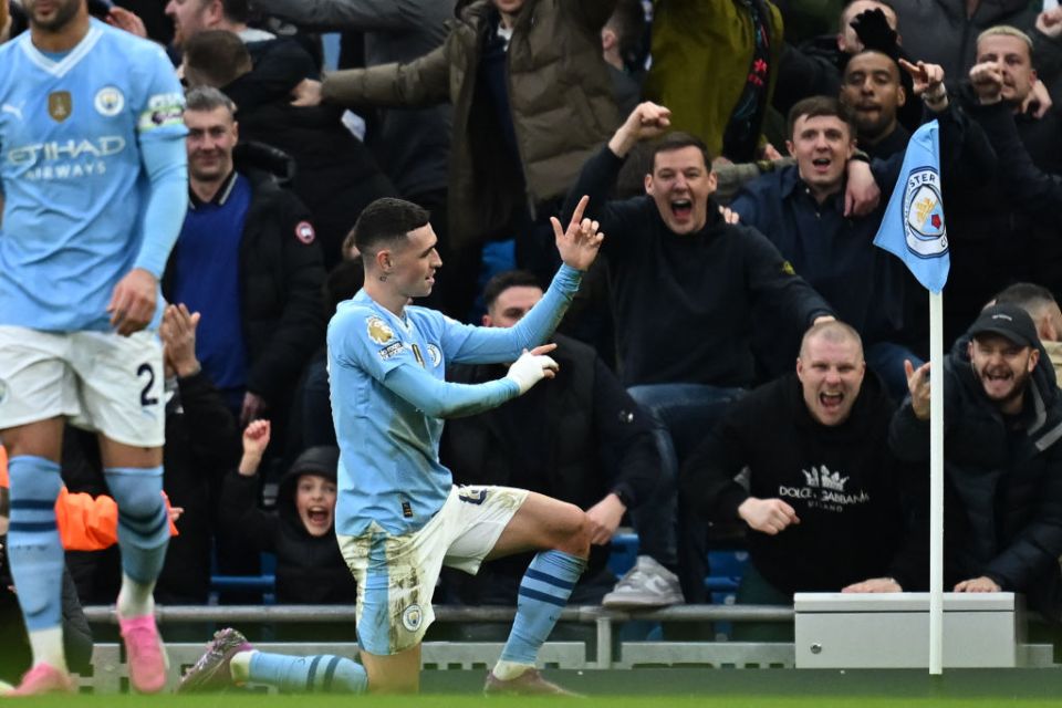 Manchester City's English midfielder #47 Phil Foden celebrates after scoring their second goal during the English Premier League football match between Manchester City and Manchester United at the Etihad Stadium in Manchester, north west England, on March 3, 2024. (Photo by Paul ELLIS / AFP) / RESTRICTED TO EDITORIAL USE. No use with unauthorized audio, video, data, fixture lists, club/league logos or 'live' services. Online in-match use limited to 120 images. An additional 40 images may be used in extra time. No video emulation. Social media in-match use limited to 120 images. An additional 40 images may be used in extra time. No use in betting publications, games or single club/league/player publications. /  (Photo by PAUL ELLIS/AFP via Getty Images)