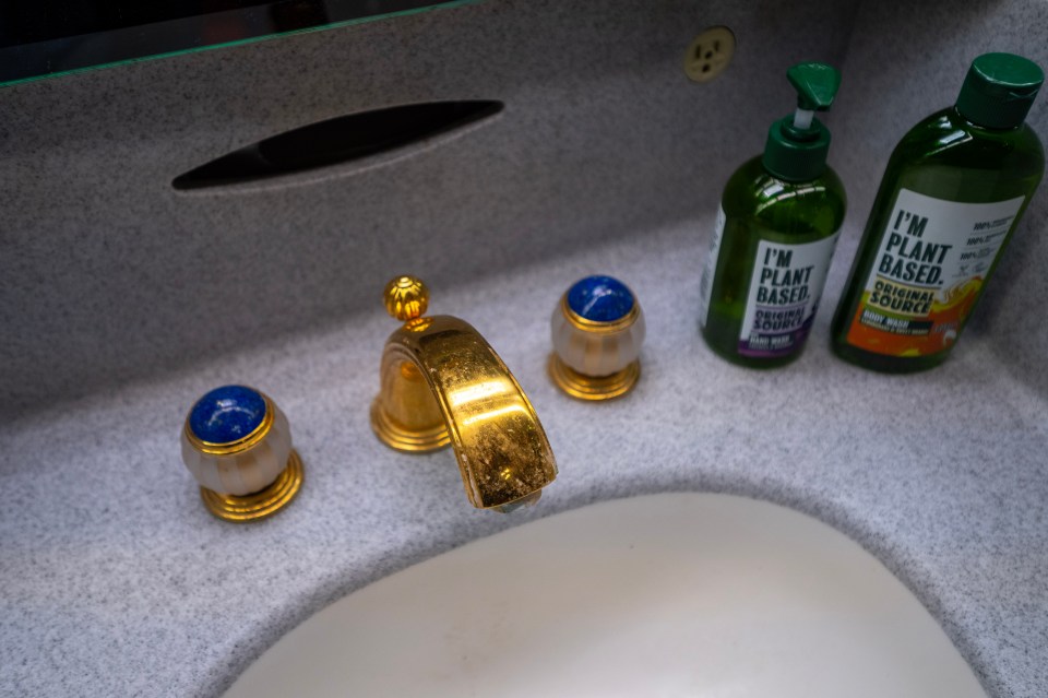 Gold plated taps in the spacious bathroom