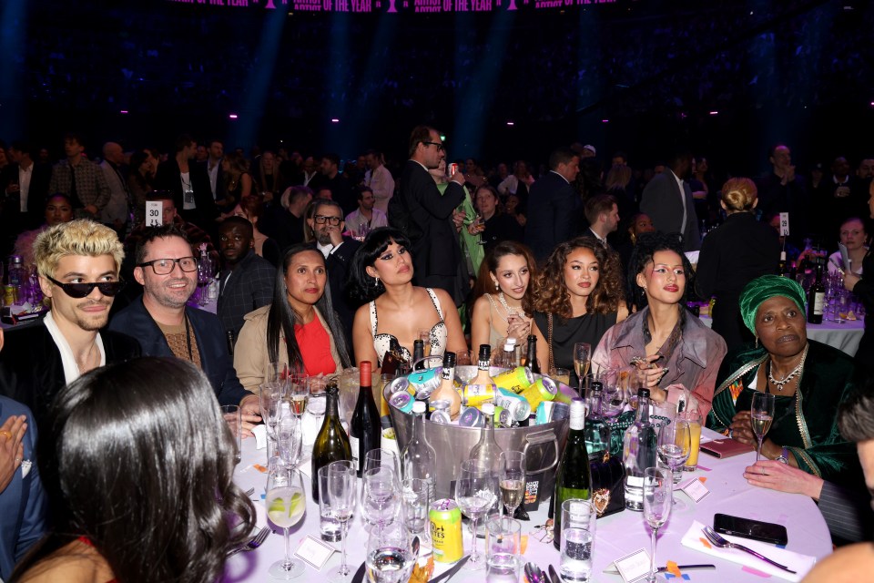 Raye with her family at the Brit Awards