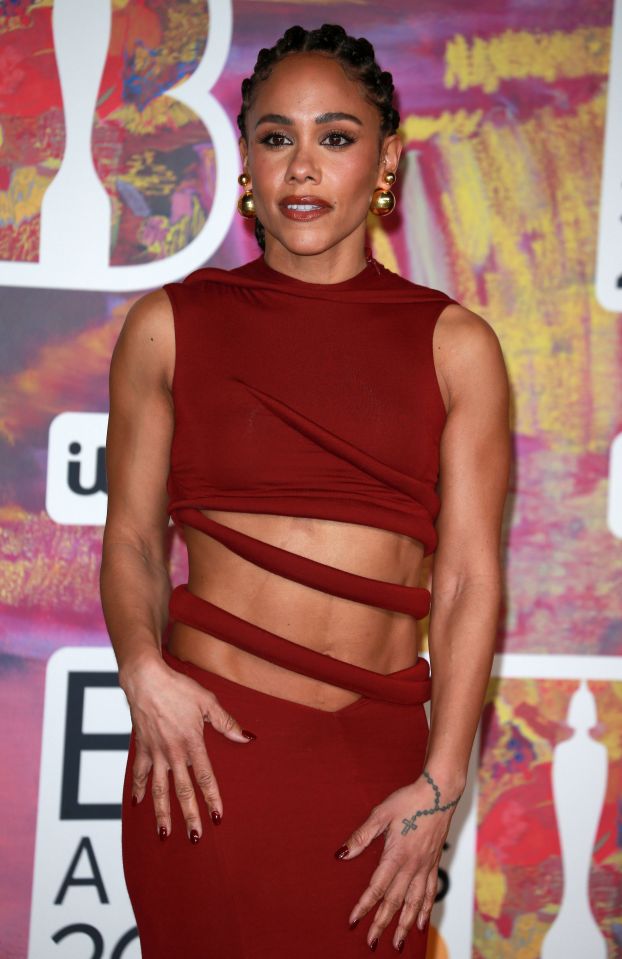 Alex Scott wore a red dress to the Brit Awards