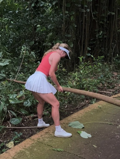 The jungle-like conditions saw falling trees block Grace's path around the course