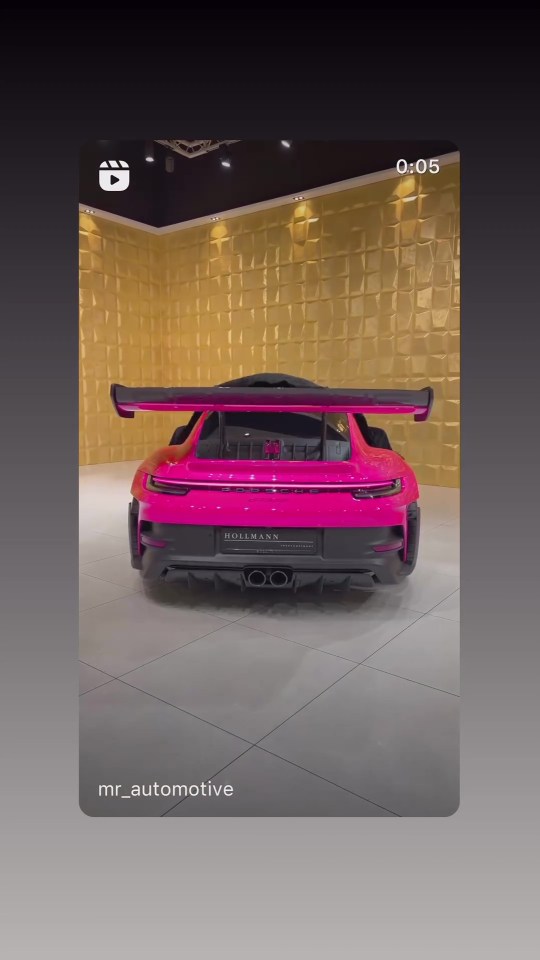 The star reshared a video of a hot pink Porsche GT3RS on her Instagram