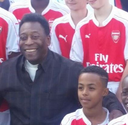 Pele with a young Omari Hutchinson at a tournament in Brentford