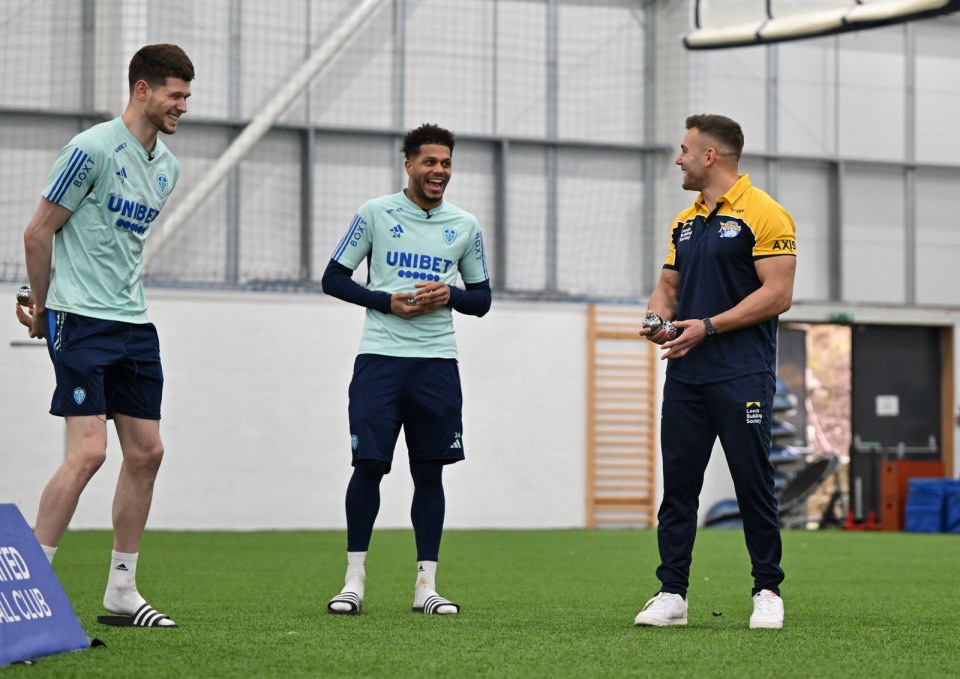 Mickael Goudemand (right) strengthened Leeds' French connection after meeting with Illan Meslier and Giorginio Rutter