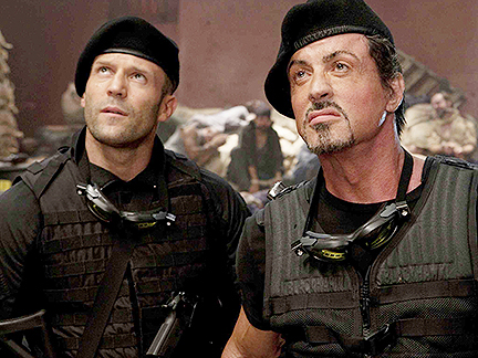 Lee Christmas (Jason Statham, left), Barney Ross (Sylvester Stallone, center) and Toll Road (Randy Couture, right) in THE EXPENDABLES. Photo credit: Karen Ballard.